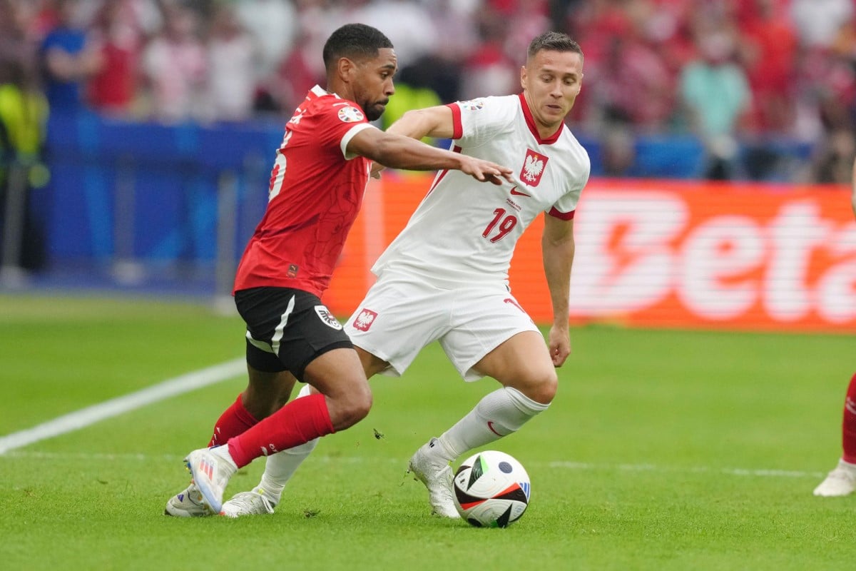 Philipp Mwene oraz Przemysław Frankowski